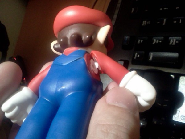 Марио с оторванной рукой